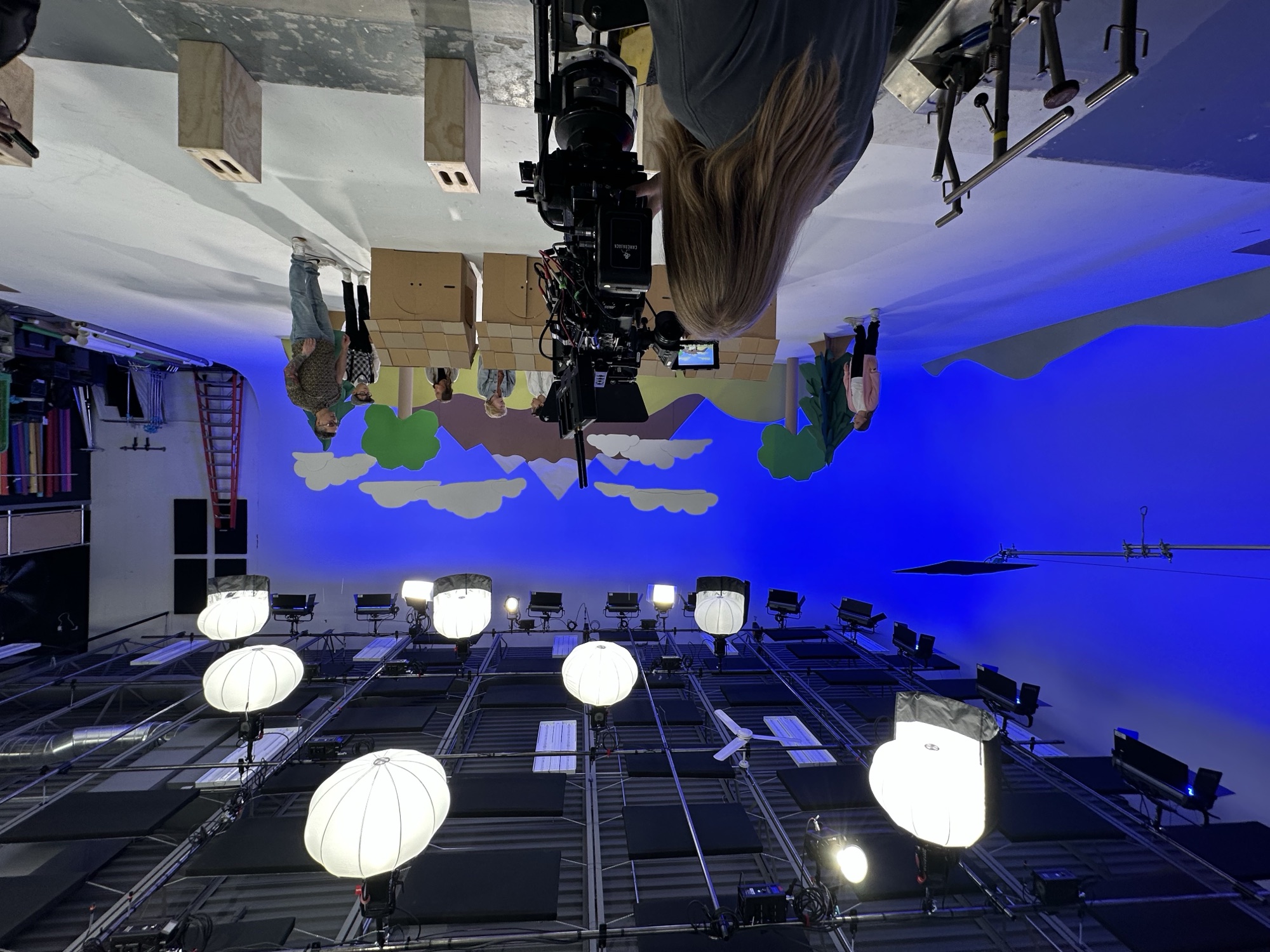 Shoot in progress under the pre-rigged grid with the cyc lit blue
